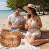 heart shaped natural wicker picnic basket closed at beach
