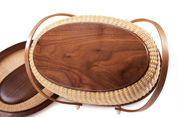 looking at bottom oval wicker picnic basket