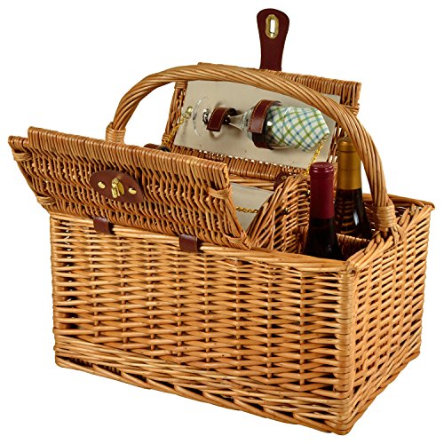 open wicker picnic basket with wine bottles