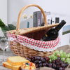picnic basket natural wicker oval open with wine bottle