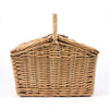 side view of a natural wicker picnic basket closed