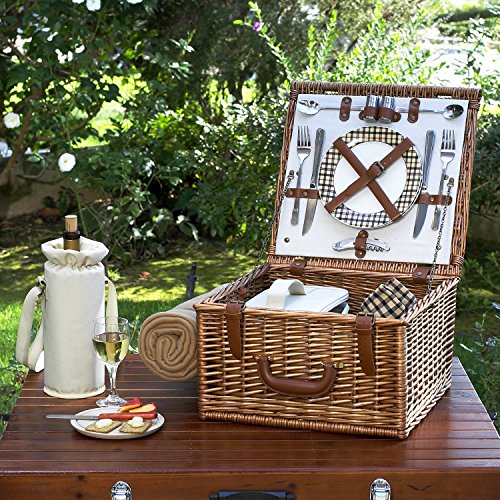 wicker brown picnic basket for two on wood table