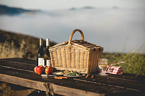 wicker picnic basket closed with vaulted roof on table
