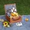 wicker picnic basket open on blue stipe picnic blanket