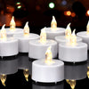 Flameless Tea Light Candles on a glass surface