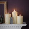 Lights4fun, Inc. Set of 3 TruGlow Ivory Wax Flameless LED Battery Operated Pillar Candles with Remote Control