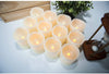 Hausware Flameless Candles Battery Operated Candles Set of 12 (D: 3" x H: 4") Real Wax Pillar Flickering Candles LED Flameless Candles with Remote and Timer Control (Ivory Color)