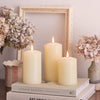 Lights4fun, Inc. Set of 3 TruGlow Ivory Wax Flameless LED Battery Operated Pillar Candles with Remote Control