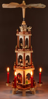 BRUBAKER Christmas Pyramid - 24 Inches - 4 Tier Carousel with 6 Candle Holder and Hand Painted Figurines - Designed in Germany - Nativity Set, Decoration