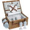 Wicker Picnic Basket with brown handle open with plates and glasses