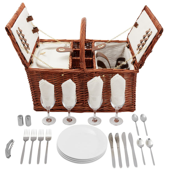 brown wicker picnic basket open with plates, glasses, utensils