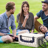 white wicker Picnic Basket with blue handle closed on grass
